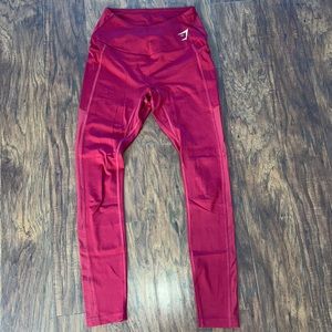 Red Gymshark leggings with cute mesh detailing on sides!